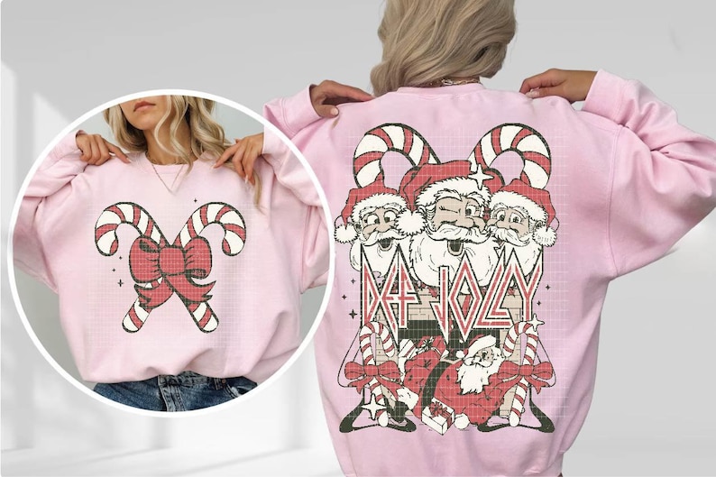 May include: Pink sweatshirt with a Christmas-themed design featuring Santa Claus and candy canes. The text "Metal Jolly" is printed on the sweatshirt.
