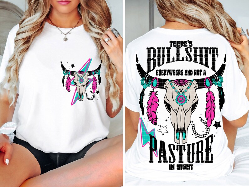 May include: White t-shirt with a graphic of a cow skull with turquoise and pink feathers and the text "There's Bullshit Everywhere and Not a Pasture in Sight".