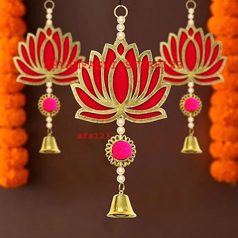 red lotus decorations with bells attached to the ends