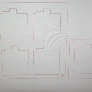 May include: Two sheets of clear plastic with red lines outlining rectangular shapes. The top sheet has six rectangles, labeled "RG-P402". The bottom sheet has two rectangles, also labeled "RG-P402".