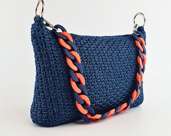 Medium blue baguette or shoulder bag, crocheted, handmade, with blue and orange acrylic handle, interior lining and zipper.