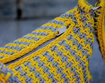 Yellow and gray medium baguette or shoulder bag, crocheted, handmade, with woven handle, interior lining and zipper closure.