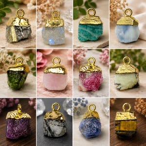 May include: A collection of gemstone pendants with gold-colored caps and loops. The pendants feature various colors and textures, including gray, blue, green, pink, and purple. The gold caps add a touch of elegance to the natural stone pendants.