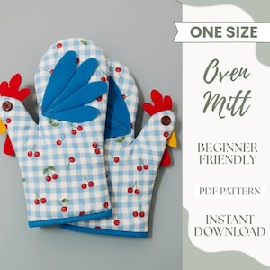 May include: A pair of oven mitts with a whimsical chicken design. The mitts feature a blue and white checkered pattern with red cherries. The chicken's comb and wattle are red and yellow, with a brown button eye. The text "Oven Mitt" and "Beginner Friendly" are visible.