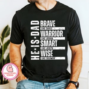 May include: Black t-shirt with white text that reads "He is Dad. Brave like David. Warrior like Joshua. Smart like Joseph. Wise like Solomon."