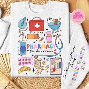 May include: A light grey sweatshirt featuring a colourful graphic design of pharmacy-related items, including a first aid kit, mortar and pestle, eye drops, pills, bandages, a stethoscope, and a prescription. The text "PHARMACY technician" is written in colourful letters. The text "Can't talk right now Doing PHARMACY TECHNICIAN STUFF" is written on the sleeve.