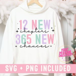 May include: White hoodie with a colorful graphic that says "12 NEW chapters 365 NEW chances". The graphic is in a distressed font style. The text "SVG + PNG INCLUDED" is at the bottom of the image.