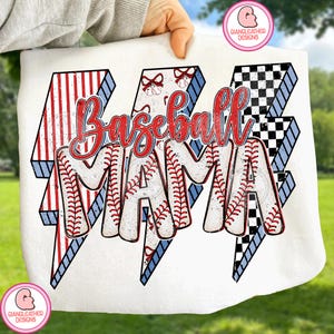 May include: White tote bag featuring the text "Baseball MAMA" in red script and baseball stitching. The text is set against three lightning bolt designs in red, white, blue, and black checkered patterns. The bag is held up by a person.