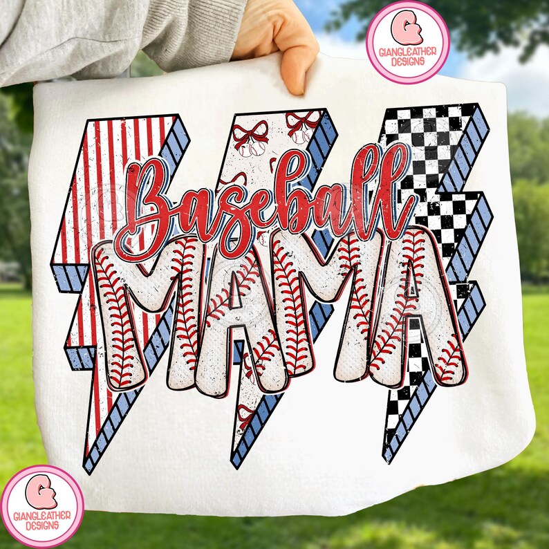 May include: White tote bag featuring the text "Baseball MAMA" in red script and baseball stitching. The text is set against three lightning bolt designs in red, white, blue, and black checkered patterns. The bag is held up by a person.