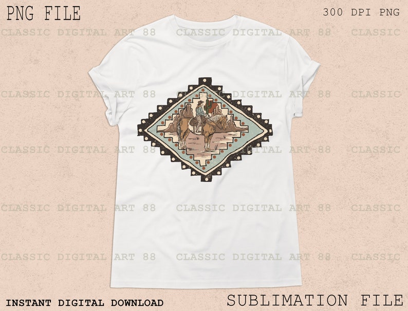 May include: A white t-shirt with a colorful geometric design featuring a cowboy riding a horse. The design is in a diamond shape with brown, blue, and white colors.