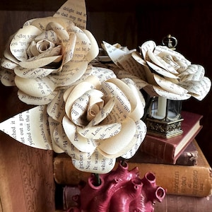 classic book page roses bouquet | dozen roses | novel page flowers | wedding home decor | staging | bookish | literary centerpiece | gift