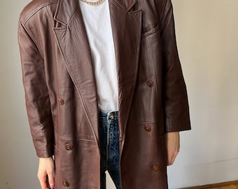 ヴィンテージブラウンレザージャケット：アーティスティックな肩使いが