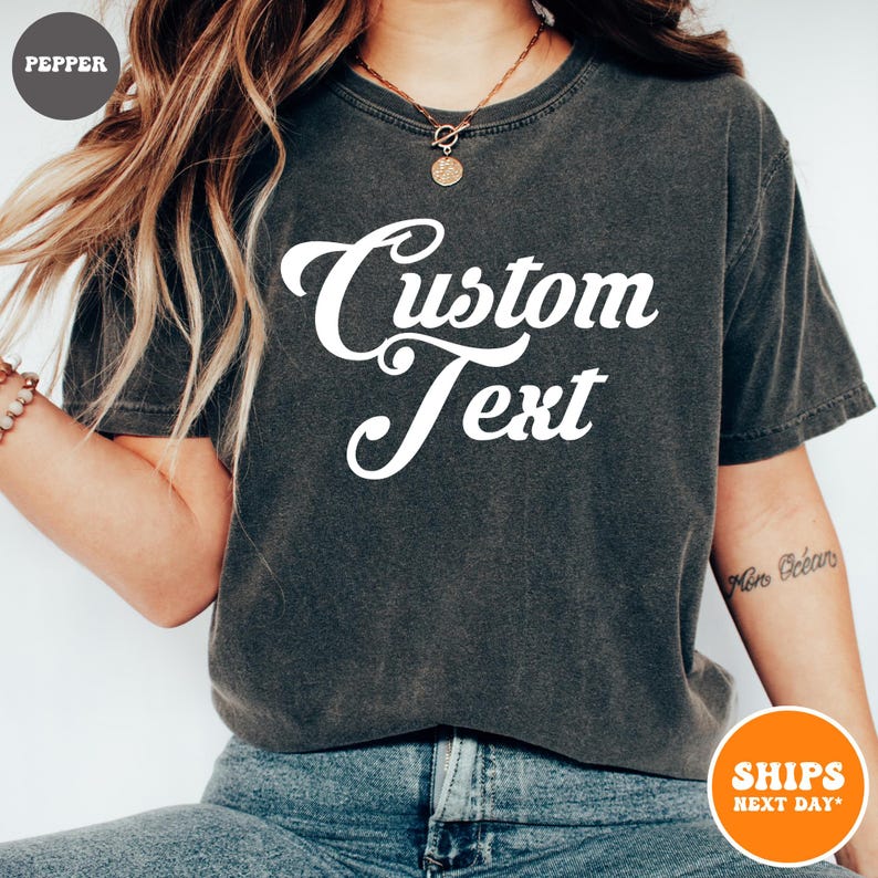 a woman wearing a black shirt with a custom text on it