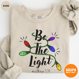 Be The Light Matthew 5:14 Crewneck Sweatshirt | Inspirational Shirt | Christian Outfit | Faith Tee | Religious Clothing | Bible Verse Gifts