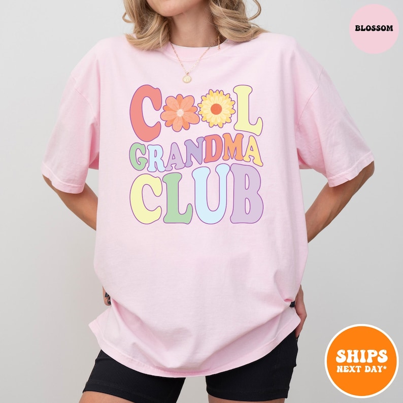 a woman wearing a pink t - shirt that says cool grandma club