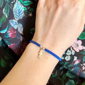 Macrame bracelet with a stainless steel seahorse pendant, blue summer jewelry