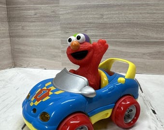 Coche de juguete TYCO de Elmo de Barrio Sésamo de 1999, 6 pulgadas, Press & Go Racer Vintage