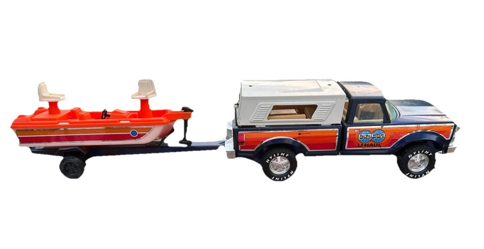 Toy Truck With Boat and Trailer