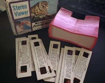 Visor estéreo antiguo Maravillas del mundo animal Realidad en 3D a color