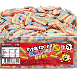 May include: A large clear container filled with rainbow-coloured candy belts. The packaging features the text "Sweetzone Rainbow Belts" and nutritional information. The container holds 350 pieces of candy and weighs 805g.