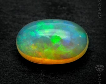 Opale 2,70 carats. Cabochon en vrac, pierre précieuse ovale naturelle, opale australienne arc-en-ciel, 12 x 8 mm.