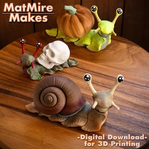 May include: Three whimsical snail figurines with unique shells, including a pumpkin, a skull, and a spiral design. The snails are in shades of green, brown, and tan, with large, expressive eyes. The text "MatMire Makes" and "-Digital Download- for 3D Printing" are visible.
