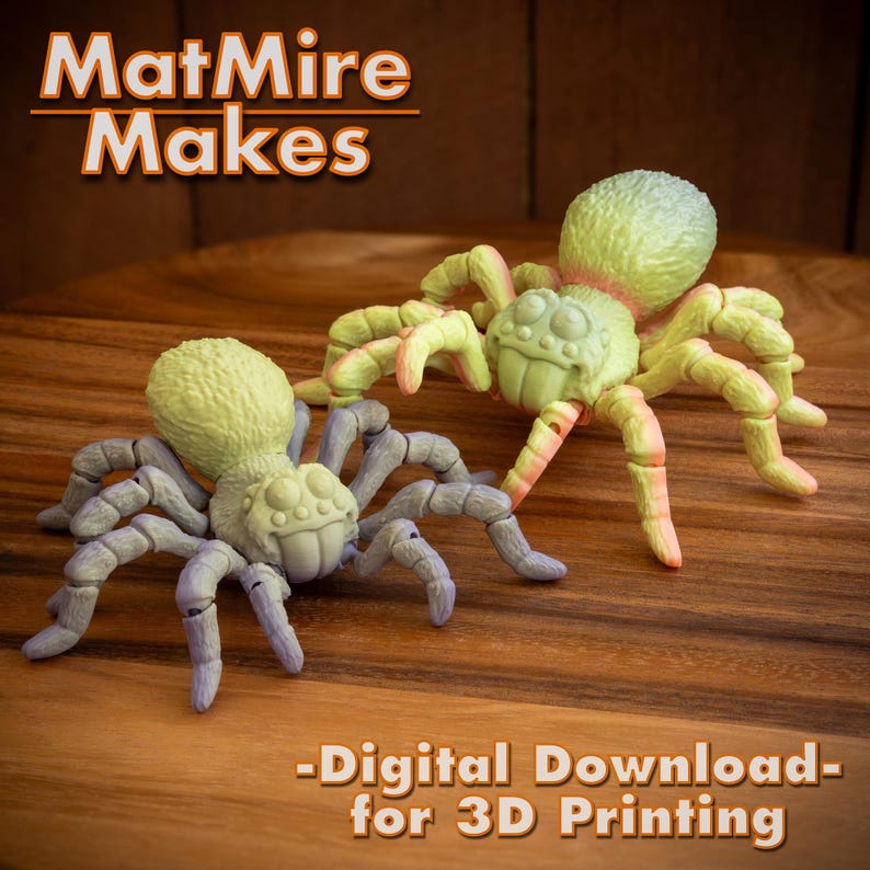 May include: Two 3D printed spider models, one in a light green and yellow color scheme and the other in a purple and light green color scheme. The text "MatMire Makes - Digital Download for 3D Printing" is visible below the spiders.