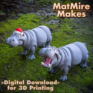 May include: Two gray hippopotamus figurines, one wearing a Santa hat, are displayed on a bed of green moss. The image includes the text "MatMire Makes" and "-Digital Download- for 3D Printing". The hippos have open mouths and are posed as if they are walking.