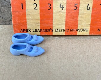 Pair of miniature ceramic blue shoes