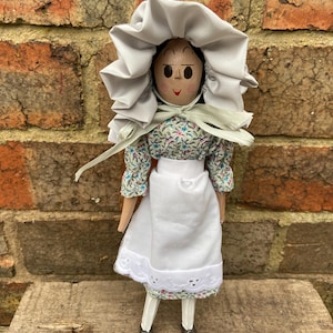 Handmade wooden peg doll
