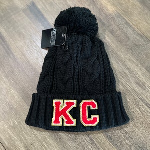 One of a kind black Pom beanie with red and gold chenille letters