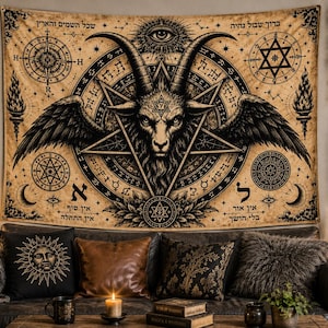 May include: A rectangular wall tapestry featuring a central black and beige illustration of a winged goat head within a pentagram, surrounded by occult symbols, Hebrew text, and celestial motifs including an eye, stars, and crescent moons.