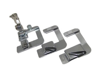 May include: Three silver sewing machine presser feet attachments. The feet are designed for different types of sewing projects.