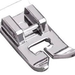 May include: A silver sewing machine foot with a small opening in the front. The foot is designed for sewing straight seams.