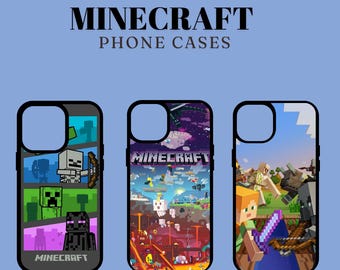 May include: Three different phone cases featuring Minecraft characters and designs. The cases are black with a clear plastic back. The first case features a green creeper, a purple ender man, and a skeleton. The second case features a Minecraft landscape with a sky, clouds, and a red lava pit. The third case features a Minecraft character holding a sword and standing in front of a green landscape.