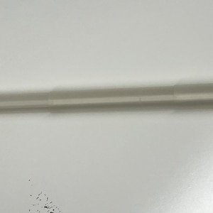 May include: A white, telescoping, extendable pole made of plastic.