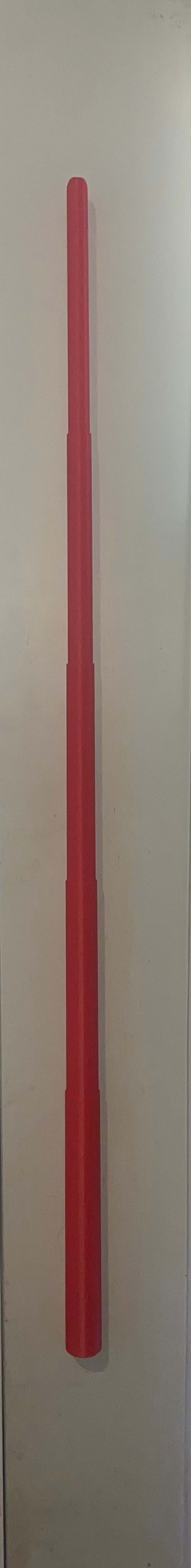 May include: A long, thin, red, cylindrical object. It is made of multiple stacked pieces.