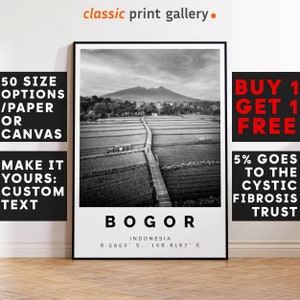 May include: Monochrome framed print depicting Bogor, Indonesia, with a mountain vista and a wooden walkway through rice paddies. The print includes the city's name and geographical coordinates. The words "classic print gallery" are at the top.