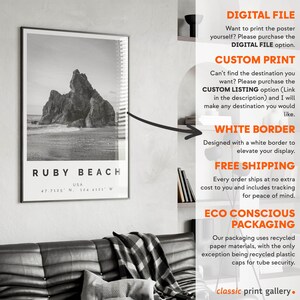 a black and white photo of a couch with a poster above it