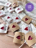 Personalized heart-shaped lollipop, perfect as a party favor for baptisms, weddings, birthdays, or other events. Already assembled and ready to give. product logo
