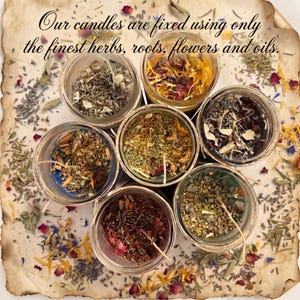 Seven glass jars of colorful dried herbs and flowers sit on a parchment background scattered with botanicals; text reads, “Our candles are fixed using only the finest herbs, roots, flowers and oils.”