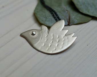 Silver necklace with dove of peace made of sterling silver, bird pendant made of silver with surface structure