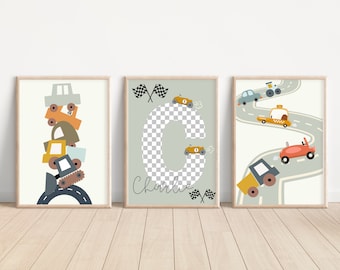 May include: Three printable wall art prints featuring a light blue, green, and white color scheme with a checkered pattern. The prints feature a stack of toy cars, a letter C with a checkered pattern, and a winding road with toy cars driving on it. The text "Charlie" is written on the print with the letter C.