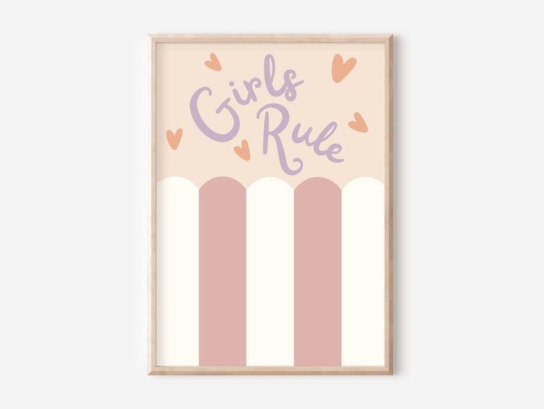 May include: A pink and white striped print with the text "Girls Rule" in purple lettering and orange hearts.