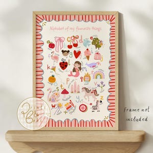 May include: A rectangular wall art print titled Alphabet of my favourite things, featuring colourful illustrations for each letter from A to Z. The print has a red and white striped scalloped border and includes a circular logo reading Prints & Bobs.