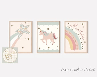 May include: Three printable wall art prints featuring a pink unicorn, a rainbow with floral details, and a star with floral details. The rainbow print has the name "Martha" written on it.