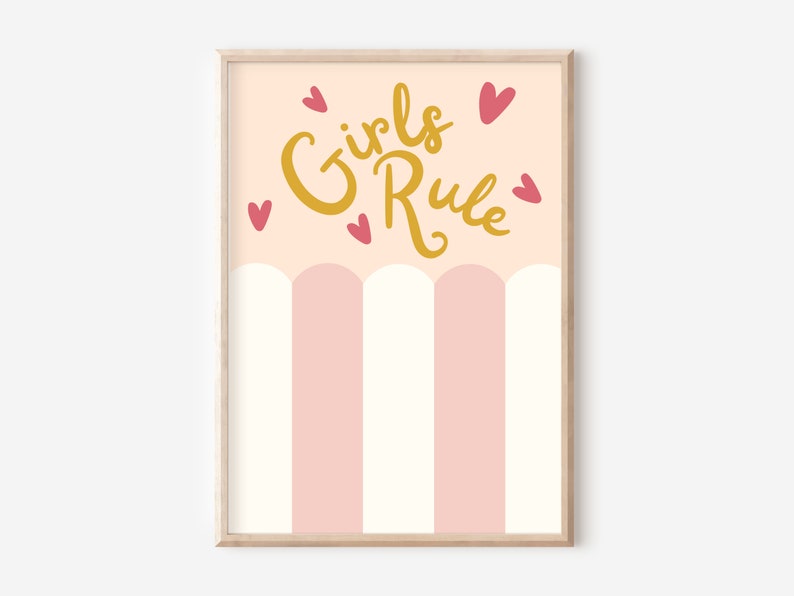 May include: A pink and white striped background with a gold inscription that reads "Girls Rule" with pink hearts scattered around the text.