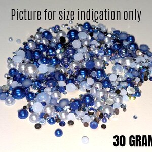 May include: A close-up of a mix of blue and white beads, including pearls, for crafting. The image shows 30 grams of beads. Picture for size indication only.