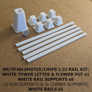 May include: A white model rail kit in 1:32 scale, featuring a tower letter, flower pot, rail supports, and rails. The kit includes six rail supports, five white rails, and a tower letter. The components are made of white plastic.