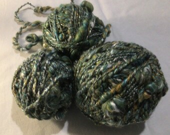 Hand spun art yarn silk & merino wool silver thread